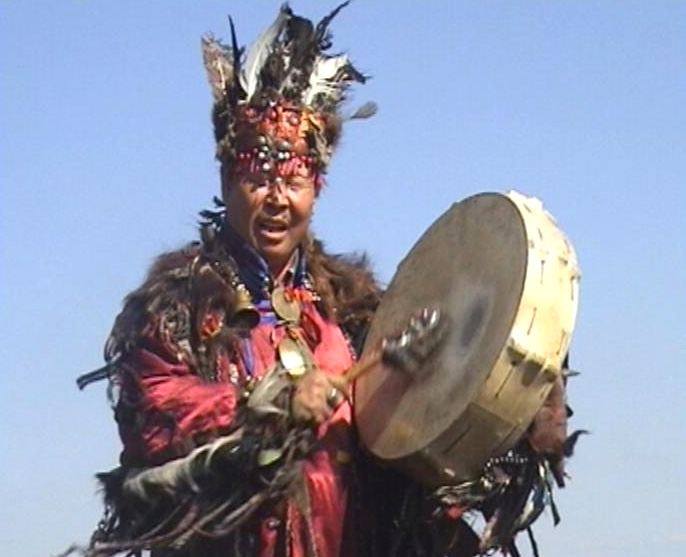 Shaman with drum | Bibliolore